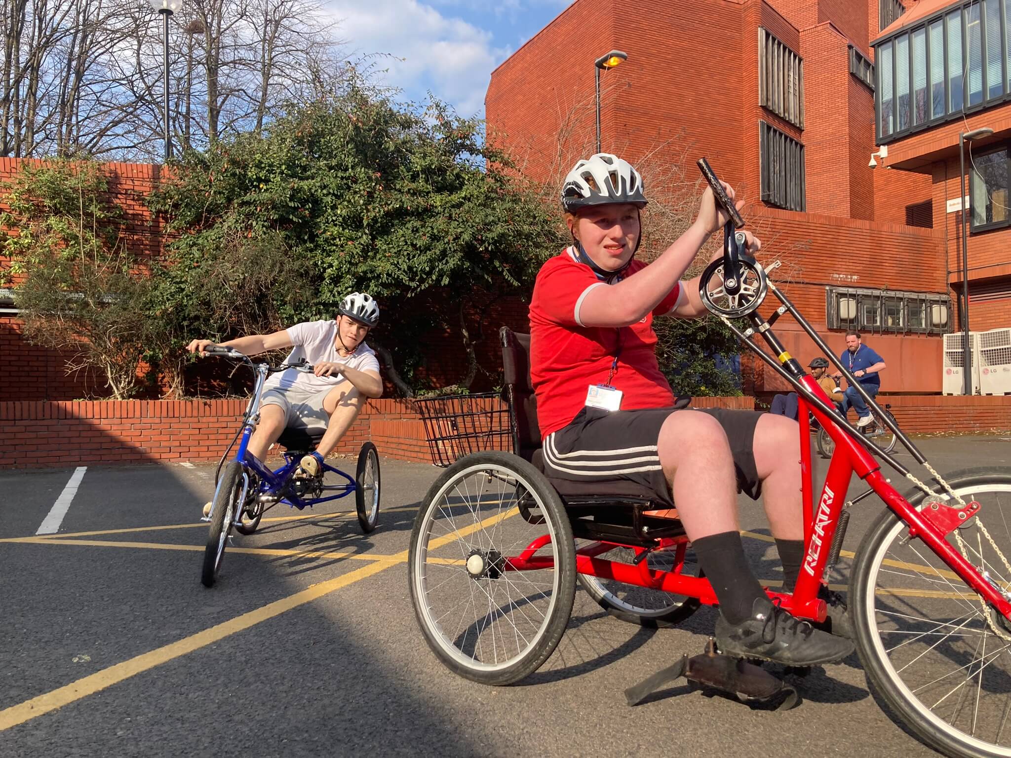 children with specialist learning needs on adapted cycles, guided by Bikeworks