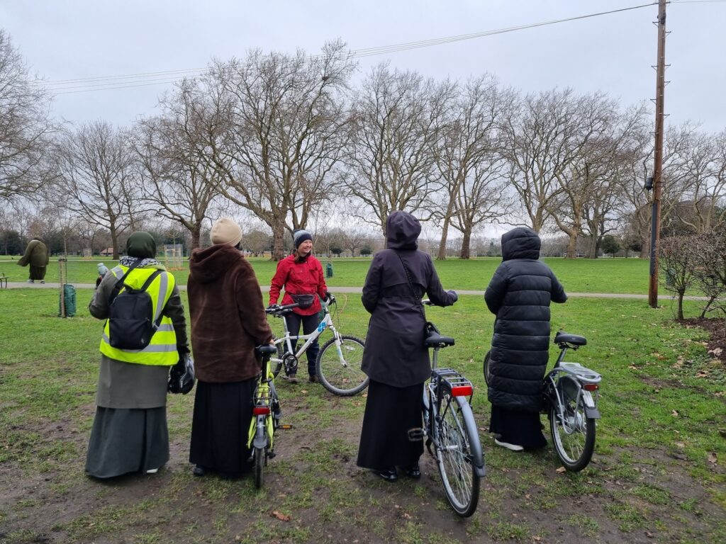 group of muslim women receiving cycle training from Bikeworks in Tower Hamlets