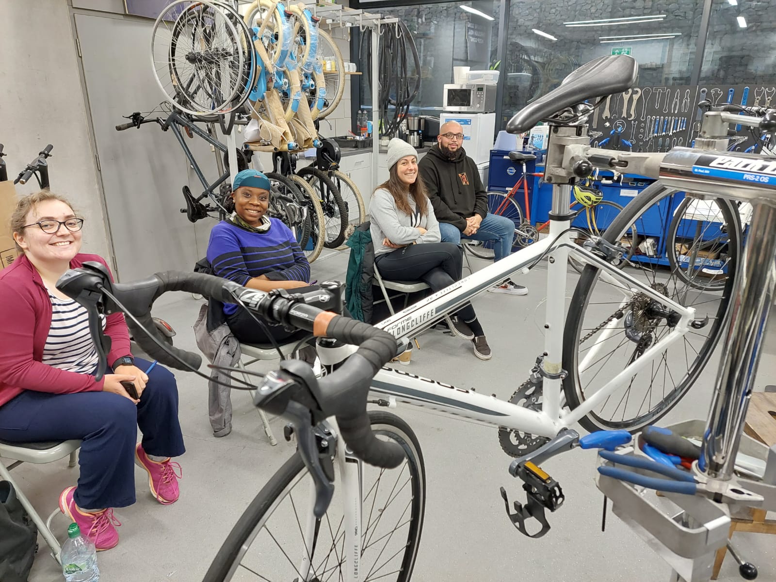 Bikeworks City & Guilds cycle mechanic cohort sitting in the workshop