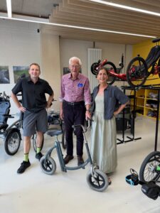 Professor Glen Norcliffe with Zoe Portlock and Jim Blakemore at Bikeworks Inclusive Cycling Hub, Queen Elizabeth Olympic Park.